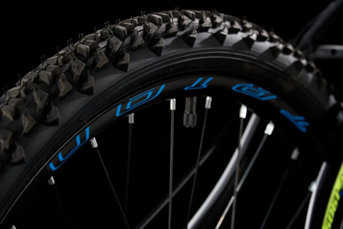 Triad M1 — tyre tread close-up